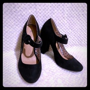 Restricted black mary jane pumps